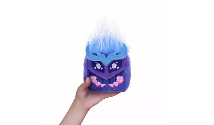 Blox Fruits Series 3 4-inch Collectable Plush in hand, featuring a blue and purple design with flames.