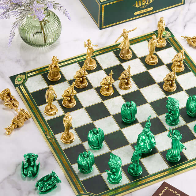 Wicked Chess Set featuring vibrant gold and green pieces on a checkered board, showcasing unique character designs.